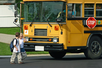 children getting off bus