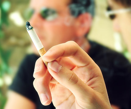 cigarette in hand