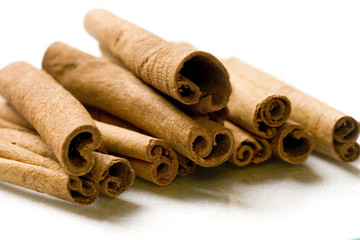cinnamon sticks on a white background