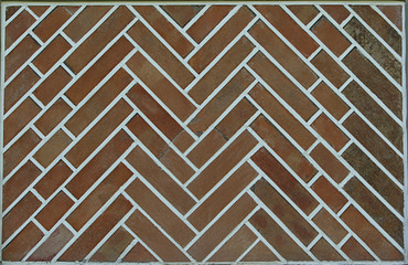 red brickwork in herringbone pattern