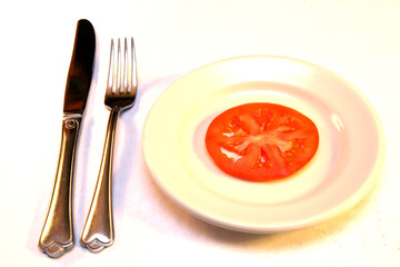 tomato slice on plate