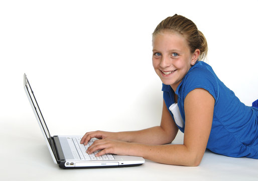 young girl checking email on laptop