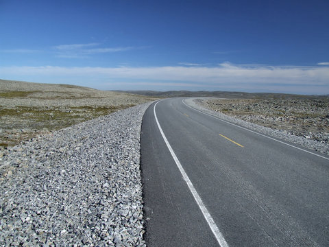 road among rocky plains in norway