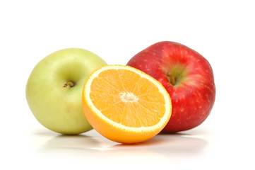 orange and two apples isolated on white