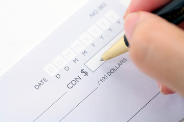 cheque with pen