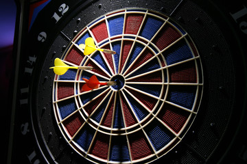 dart board with three darts