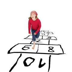 girl hopping around playing hopscotch