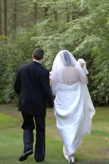 Fototapeta premium bride and groom walking away