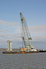 massive water crane barge on river mersey in liver