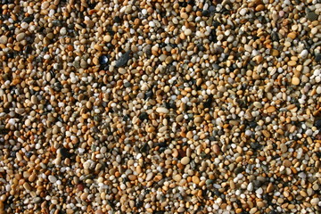 thousands of tiny pebbles on a beach.  makes a goo