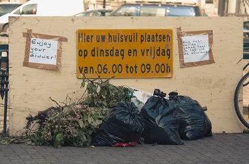 Fototapete Rund garbage in amsterdam © Eric Gevaert