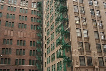 Fototapeta premium two green fire escapes