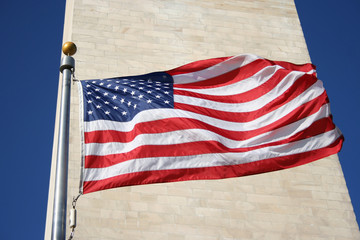 american flag and washington monument