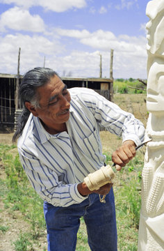 Native American Sculptor At Work Iii