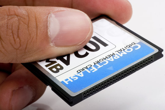hand holding compact flash memory
