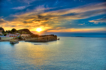 sunset over corfu island - obrazy, fototapety, plakaty