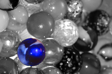 blue marble standing out