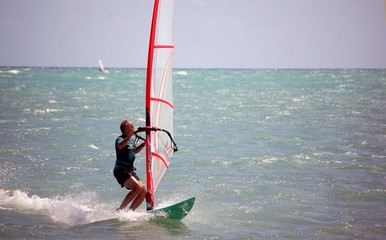 older male windsurfer