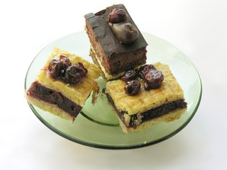 cakes on a green glass dish