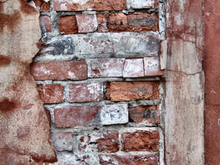 red crumbling wall decay