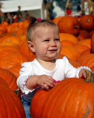 baby in pumpkin patch 1