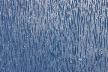 close up of blue paint on a wooden door