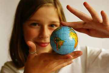 Fototapeta premium happy girl with globe