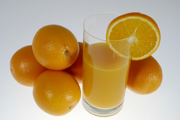 oranges and glass of orange juice