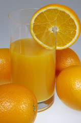 oranges and glass of orange juice