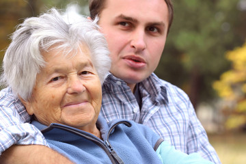 elderly woman and young man