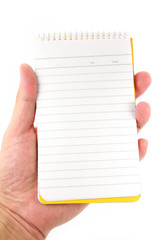 hand holding notepad