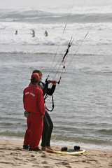 lifeguard and kitesurfer