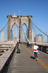 woman jogging towards new york city
