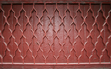 red painted metal grill