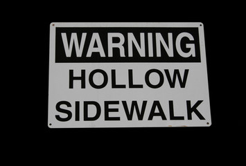 warning hollow sidewalk