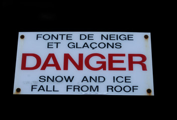 Naklejka premium bilingual winter danger sign