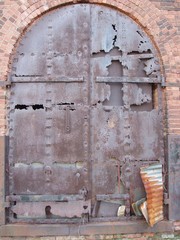 passage of time/corroded iron door