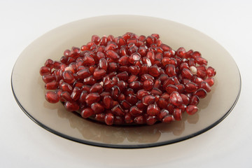 the red cleared pomegranate on a plate