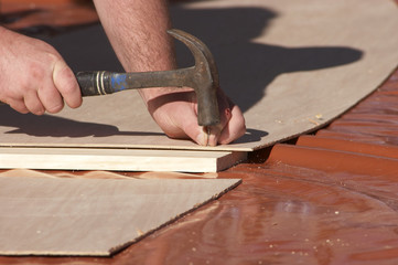 hammering a nail