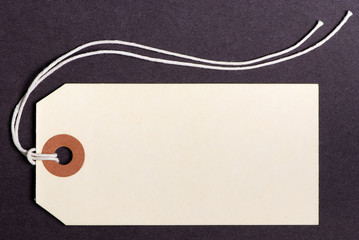 tag on brown background