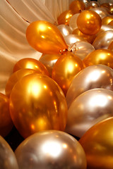 white and golden baloons