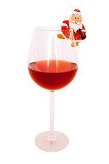 father frost (santa claus) and a glass with wine.