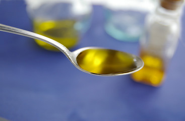 spoon of oil