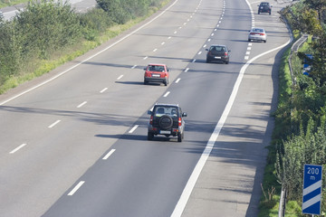 three-lane autobahn near an exchange