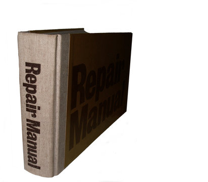 repair manual book on white background