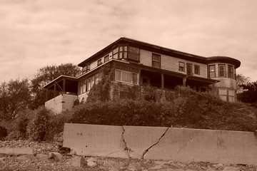 old abandoned beach house sepia