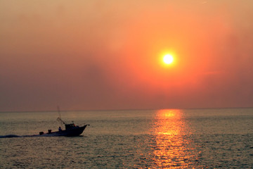 Fototapeta na wymiar sunset speedboat