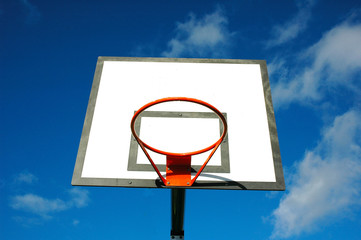 red basketball hoop and sky