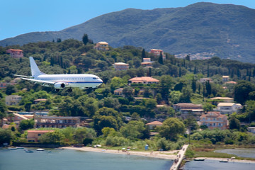 large aircraft landing on corfu island, greece