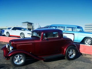 classic red hot rod at a car show